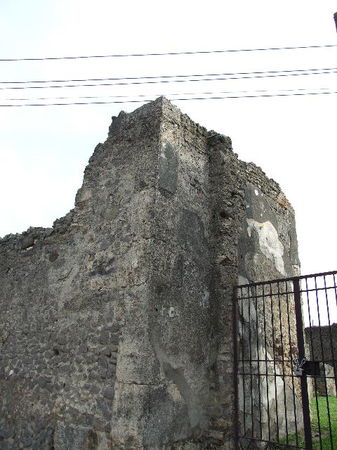 VII.4.57 House of the Figured Capitals.  Left hand side of Entrance.