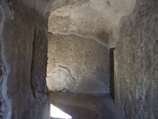 VII.5.24 Pompeii. December 2007. Corner of entrance corridor (10), turning south. Latrine (11) is on right.