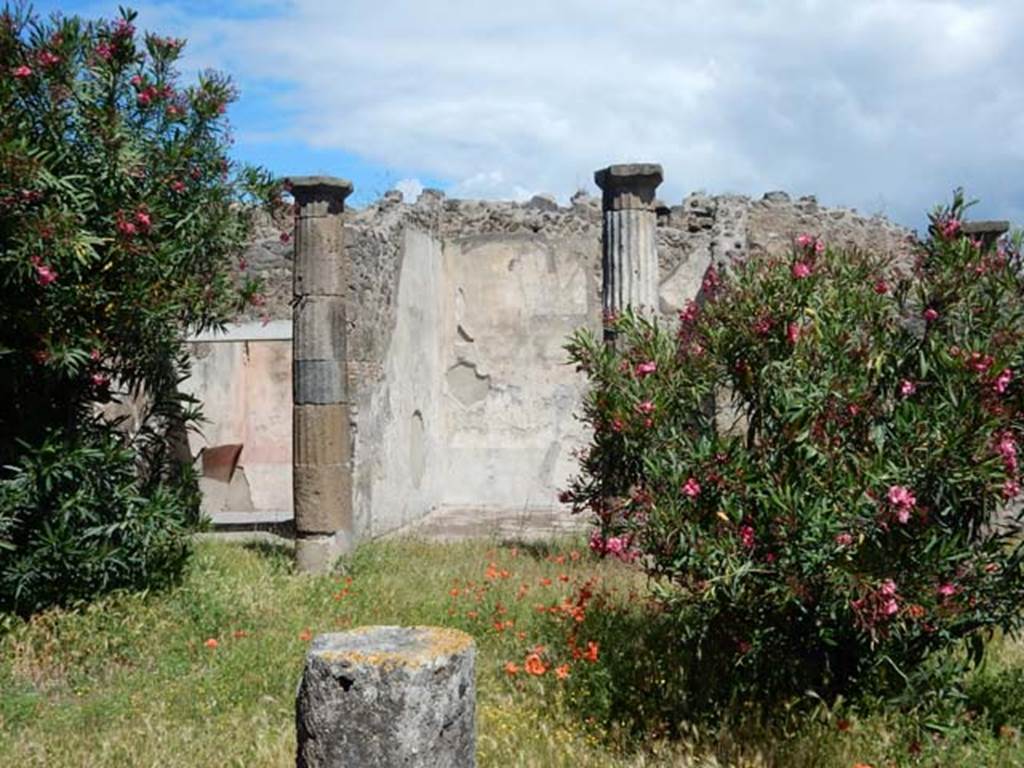 VII.7.2 Pompeii, May 2018. Looking towards north side of peristyle “x” with exedra “y”, in centre. Photo courtesy of Buzz Ferebee

