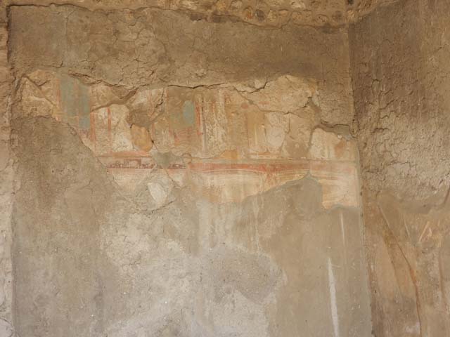 VII.7.5 Pompeii. May 2015. Detail of remains of painted decoration on north wall of exedra (u).  Photo courtesy of Buzz Ferebee.
