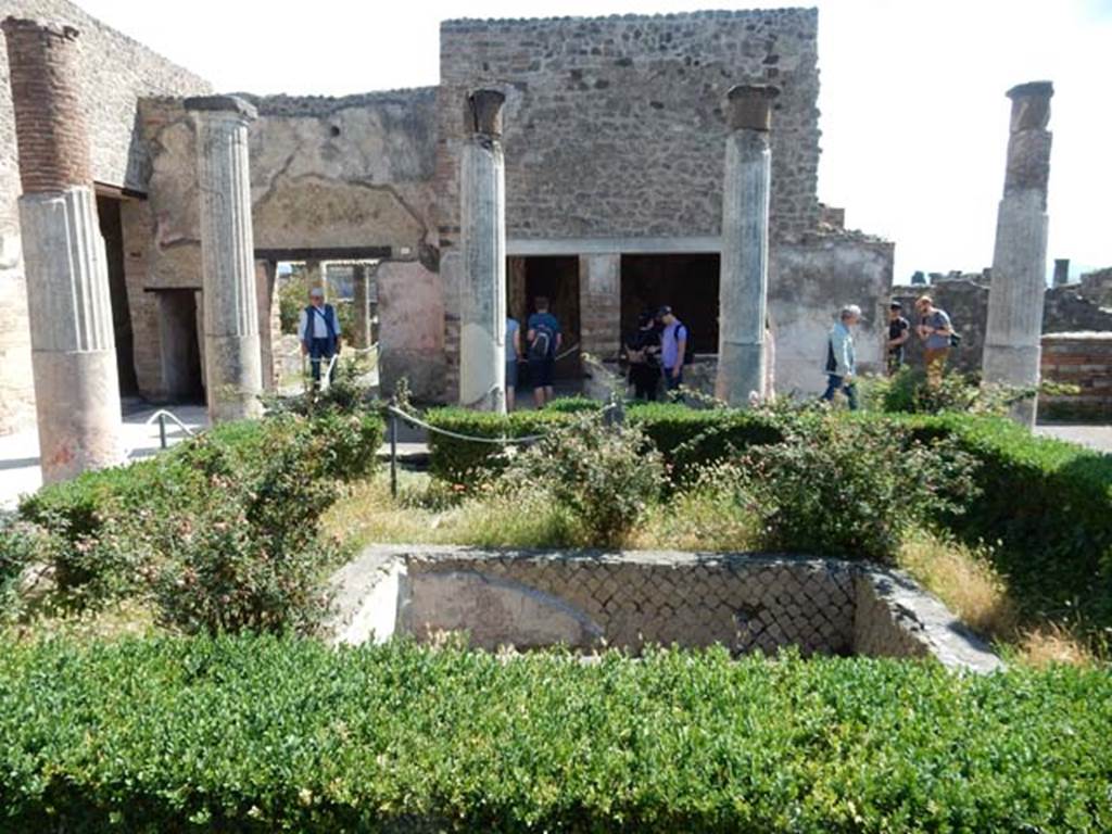 VII.7.5 Pompeii, May 2018. Looking east across peristyle, towards room “n” and remaining north wall of room “m”.
The doorway, second on left, links both houses VII.7.2 and 5 by peristyles. Photo courtesy of Buzz Ferebee.


