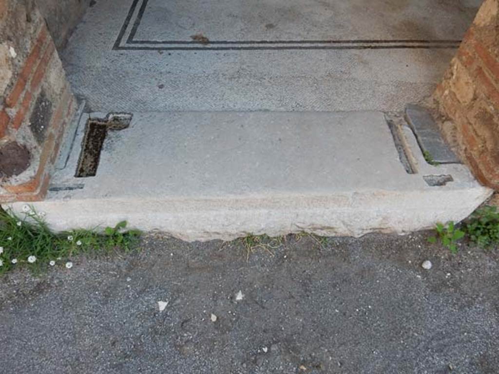 VII.7.5 Pompeii, May 2018. Room n, doorway threshold from east portico into room. Photo courtesy of Buzz Ferebee.