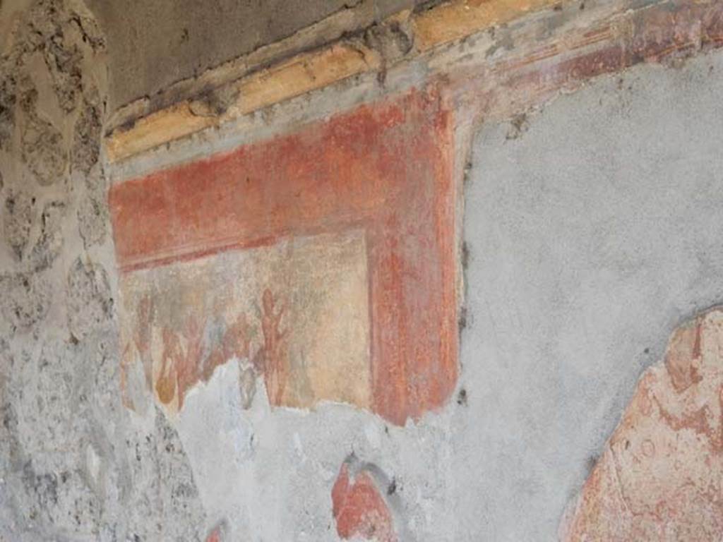 VII.7.5 Pompeii. May 2015. Oecus (m) north wall east side of peristyle.
Detail of wall painting of cupids making flower garlands. Photo courtesy of Buzz Ferebee.
