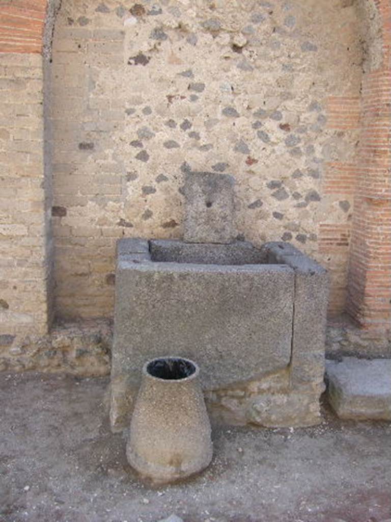 Fountain next to VII.7.26 outside north wall of VII.8