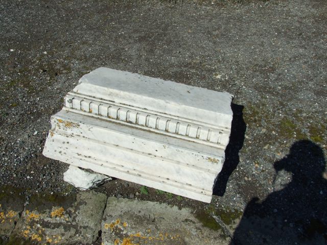 VII.9.1 Pompeii. March 2009. Carved marble on ground.