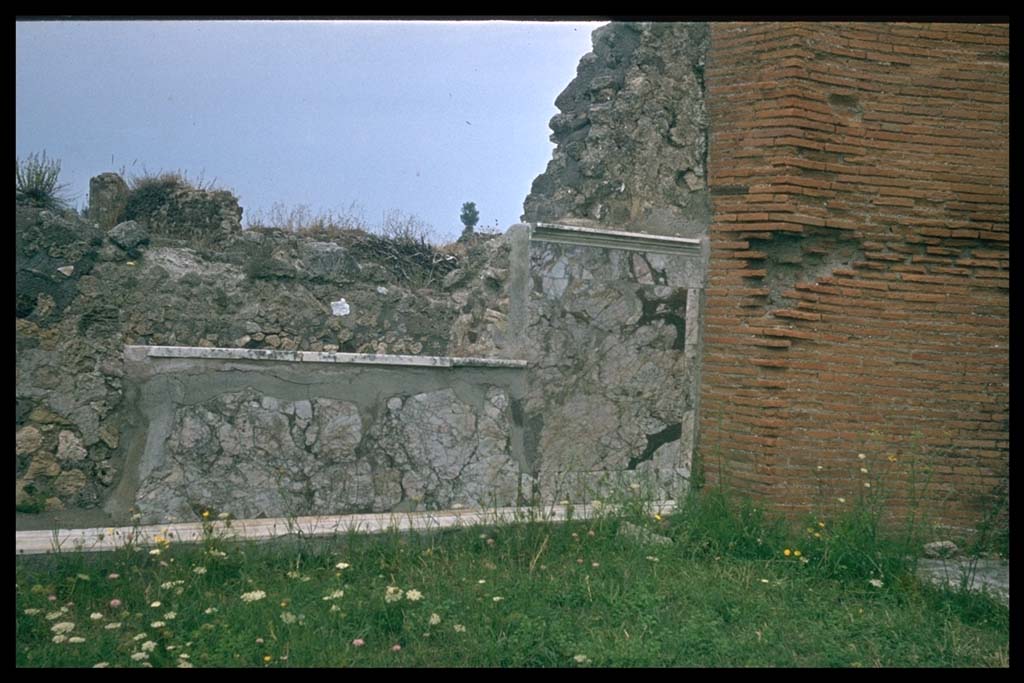 VII.9.1 Pompeii. North-east corner of colonnade 9.
Photographed 1970-79 by Günther Einhorn, picture courtesy of his son Ralf Einhorn.
