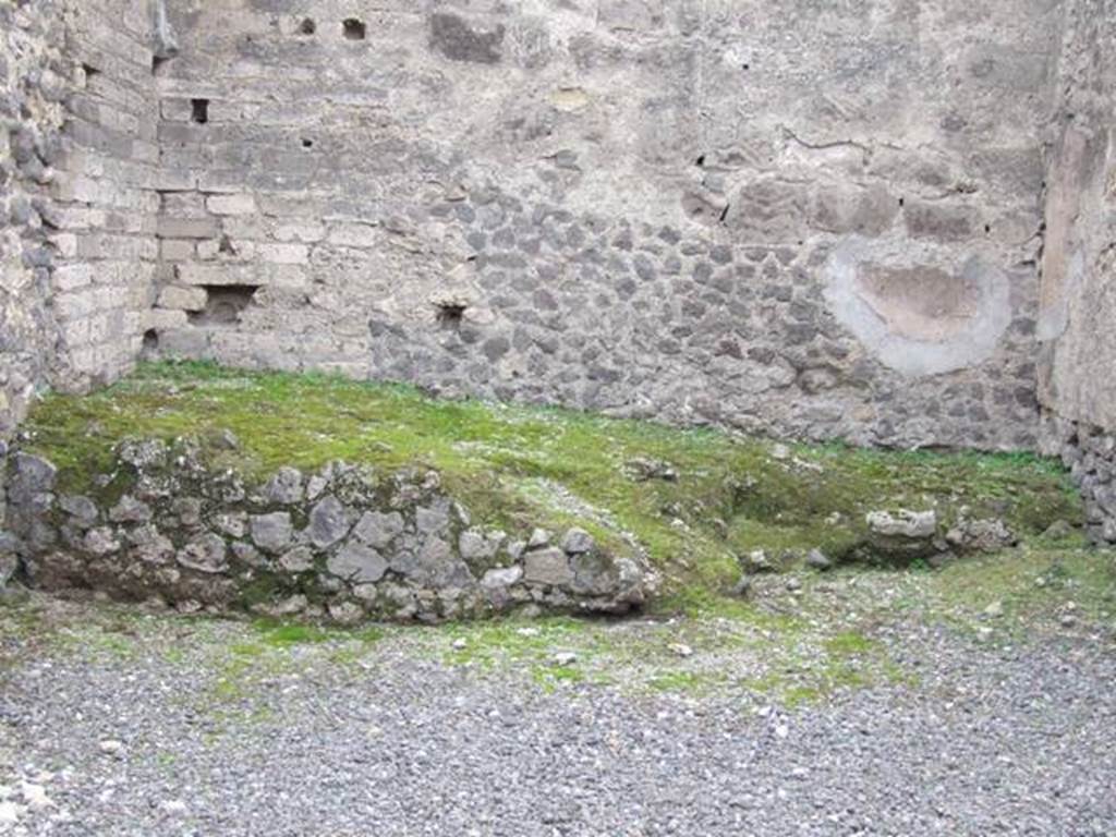 VII.9.18 Pompeii. December 2007.  Remains of two sided hearth, with a nearby latrine.

