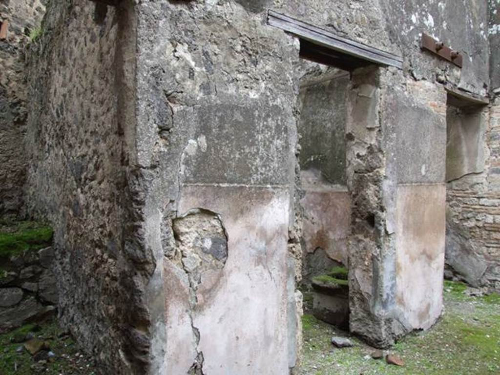 VII.11.14 Pompeii. March 2009. East side of room 8, atrium, with doorways to rooms 11, 12 and 13.