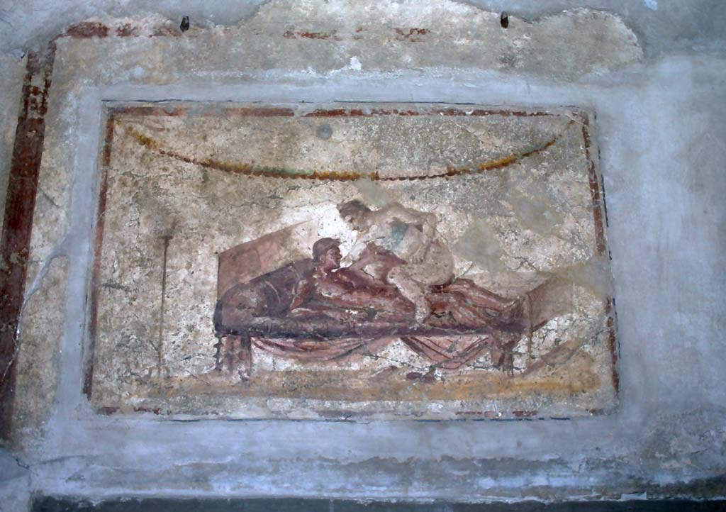 VII.12.18 Pompeii. December 2006. Erotic wall painting on frieze.
