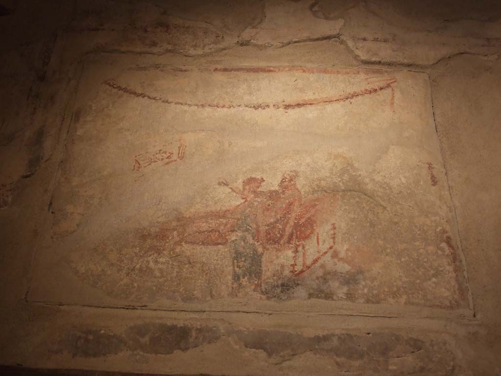 VII.12.18 Pompeii. December 2018. Erotic wall painting on frieze. Photo courtesy of Aude Durand. 