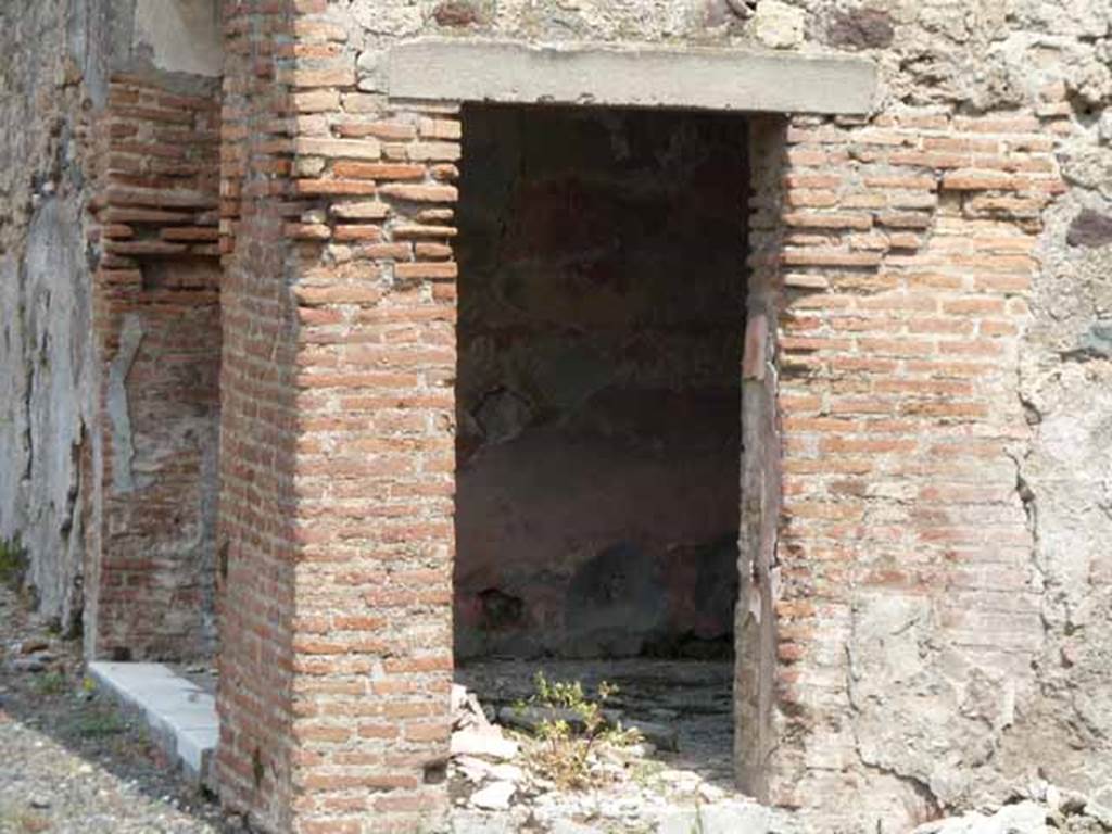 VII.13.4 Pompeii. May 2010. Two doorways of oecus.