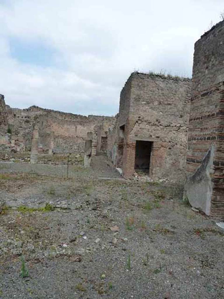 VII.13.4 Pompeii. May 2010. Looking north across atrium, towards peristyle and passage to rear entrance at VII.13.17 and 18.