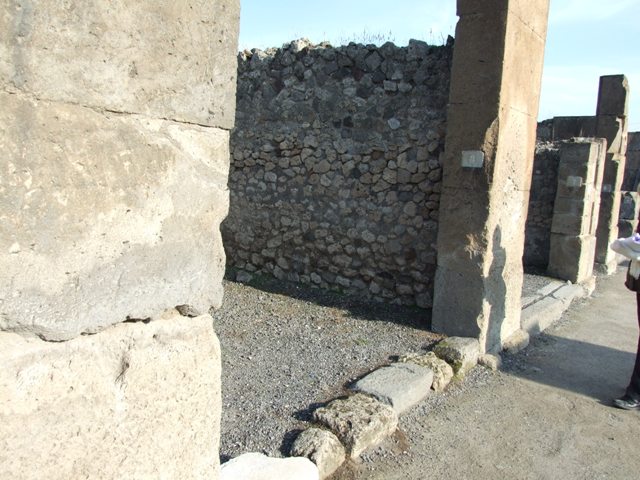 VII.13.6 Pompeii. December 2007. West wall with steps in north-west corner.