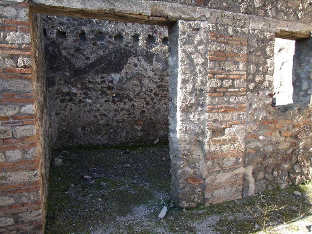 VII.14.15 Pompeii. December 2006. Doorway to cubiculum in north-west corner of garden area.