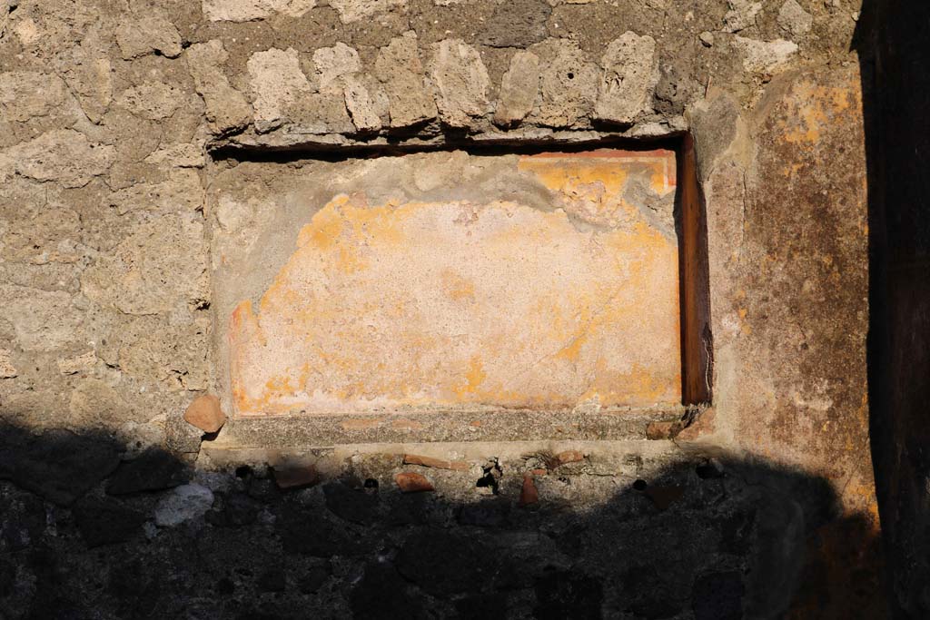 VII.15.12 Pompeii. December 2018. 
Shallow rectangular niche in east wall of atrium, as described by Boyce, above, or triclinium. Photo courtesy of Aude Durand.

