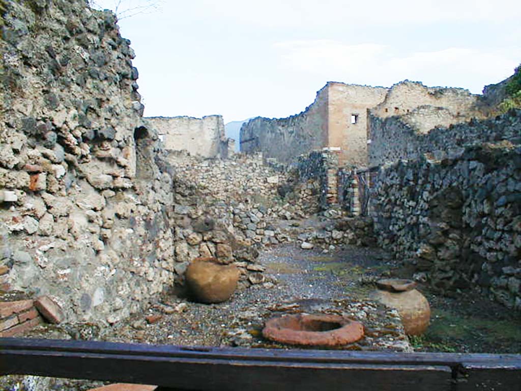 VII.16.7 Pompeii. June 2019. Looking south across bar-room from rear room, towards entrance doorway.  
Photo courtesy of Buzz Ferebee.
