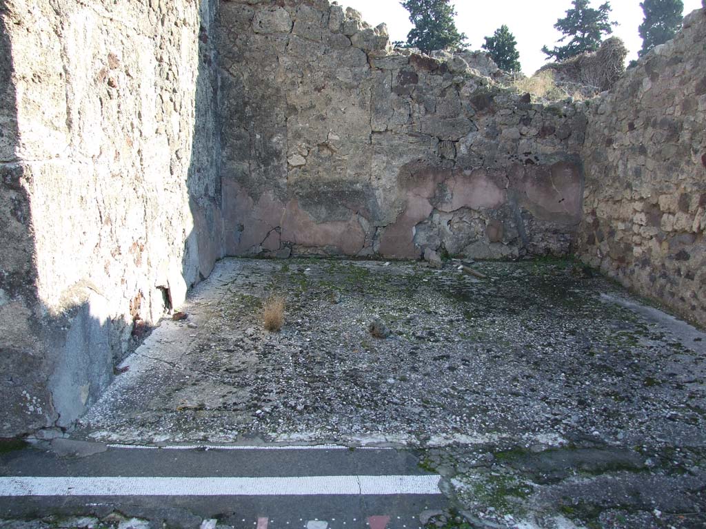 VII.16.13 Pompeii. December 2007. Doorway to room 15 left and 14 right, on south side of atrium.