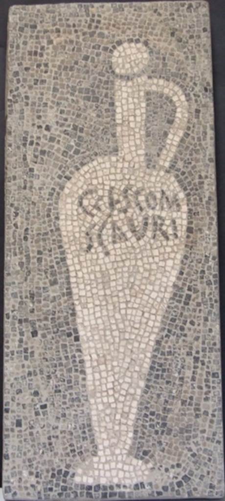 VII.16.15 Pompeii.  Room 2, atrium from corner of Impluvium. Detail of mosaic showing Garum amphora with inscription 
G(ari) F(los) SCOM(bri) SCAURI 
SAP inventory number 15189.
See Aoyagi M. and Pappalardo U., 2006. Pompei (Regiones VI-VII) Insula Occidentalis. Napoli: Valtrend. (P. 511).
