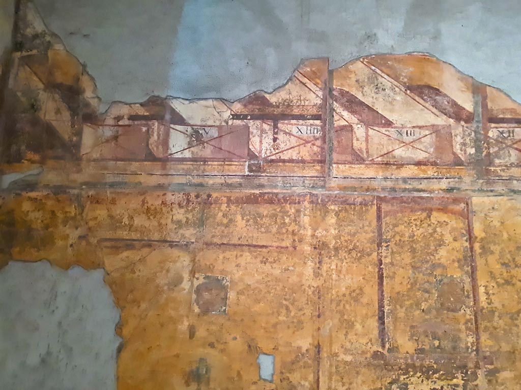 VII.16.a Pompeii. May 2015. Room 7, fresco from south wall, with number VII beneath.
Photo courtesy of Buzz Ferebee.
