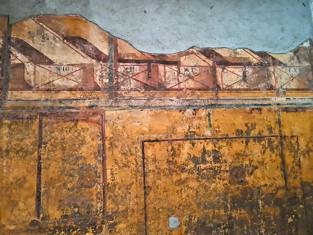 VII.16.a Pompeii. November 2023. Room 7, detail from upper east wall. Photo courtesy of Giuseppe Ciaramella.