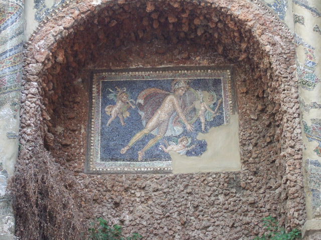 VII.16.a Pompeii. September 2005. Room 9, nymphaeum.  Detail of mosaic centrepiece with Mars and three cherubs.