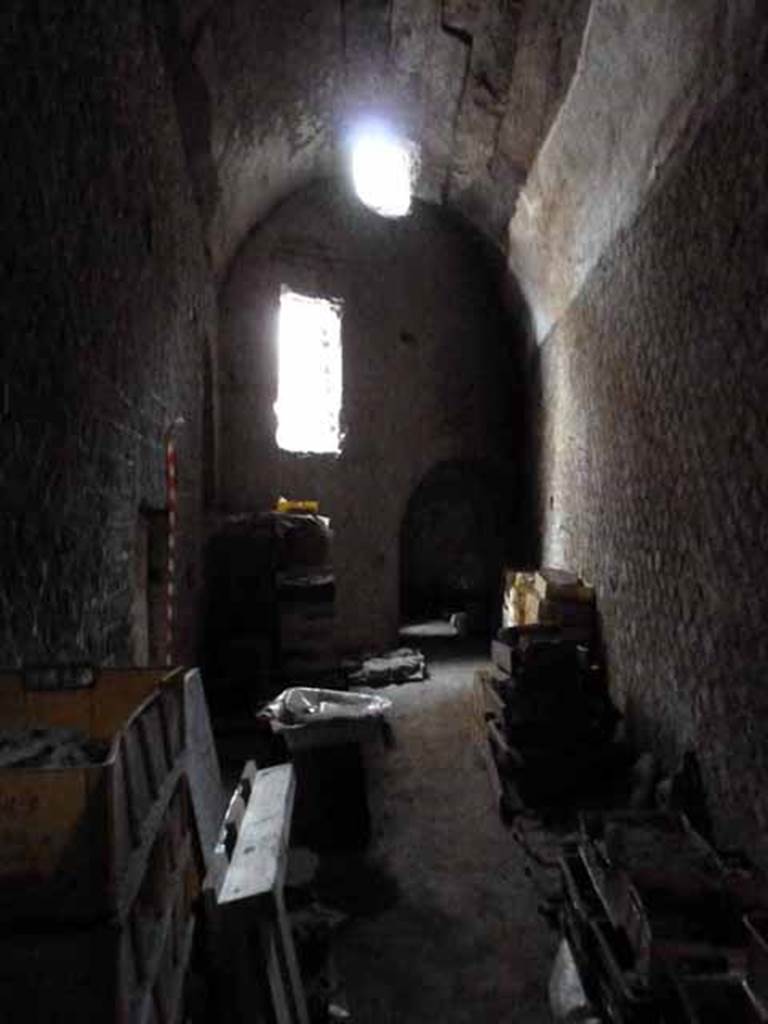 VII.16.a Pompeii. May 2010. Looking north in corridor 15, under the arch is corridor 13.