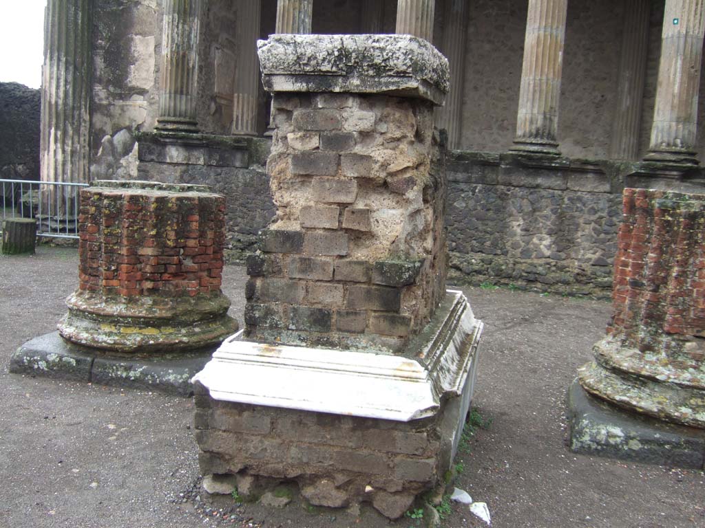 VIII.1.1 Pompeii. December 2005. Basilica, west side with statue base in main central room.
