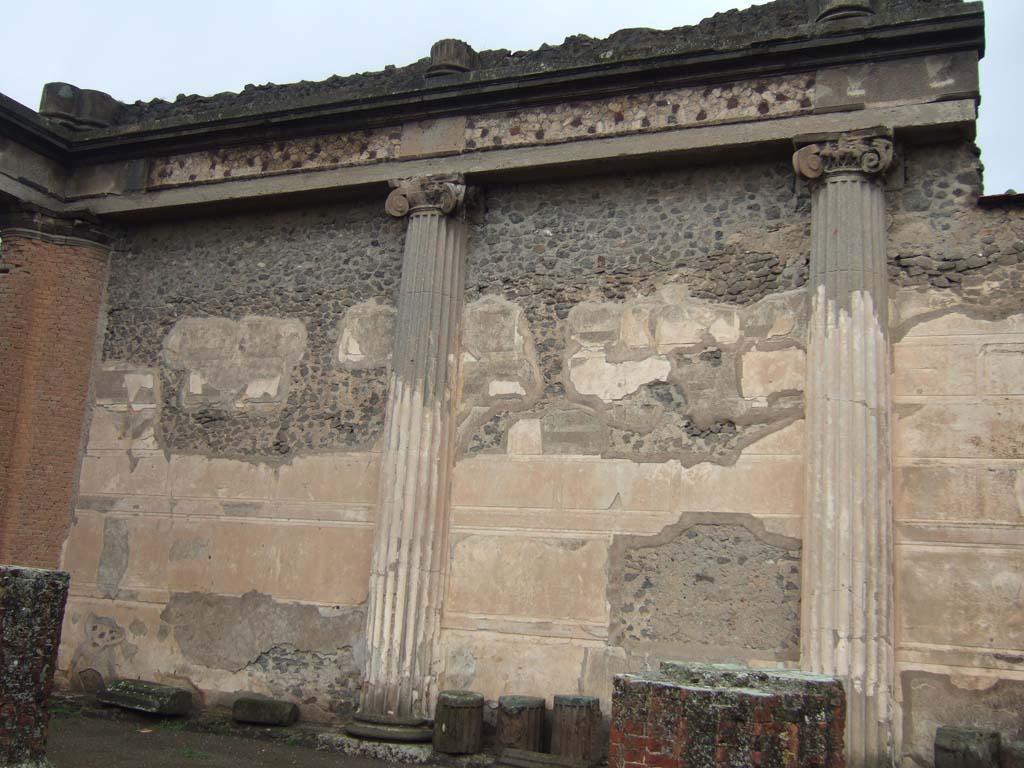 VIII.1.1 Pompeii. December 2005. Basilica, north-west corner, remains of half round columns and stucco plaster.