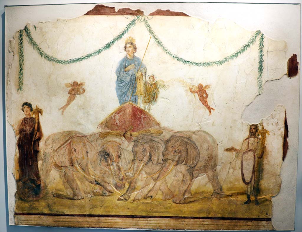 VIII.1.4 Pompeii. February 2021. 
Fresco of Venus standing on a quadriga and being pulled by elephants, from outside House of Verecundus, between doorways IX.7.7 and IX.7.6. 
Photo courtesy of Fabien Bièvre-Perrin (CC BY-NC-SA).

