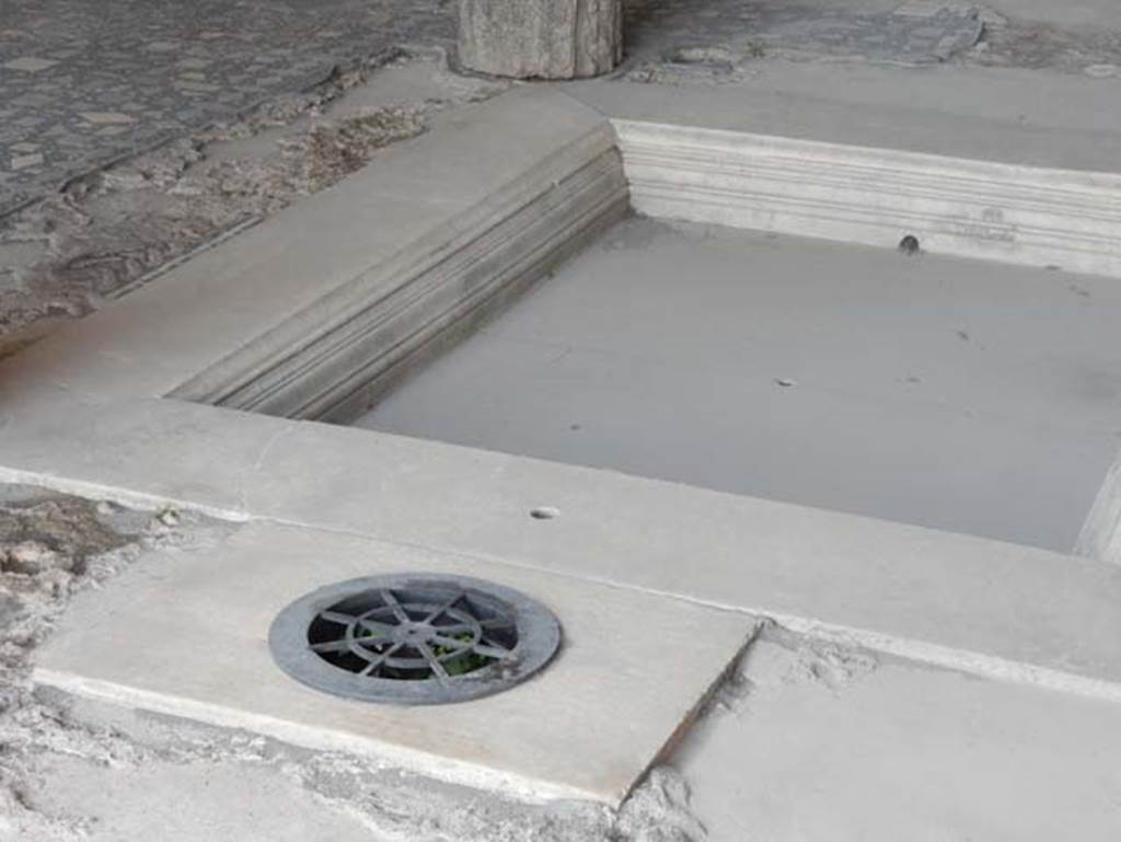 VIII.2.1 Pompeii. May 2018. Detail of modern cistern mouth cover. Photo courtesy of Buzz Ferebee.