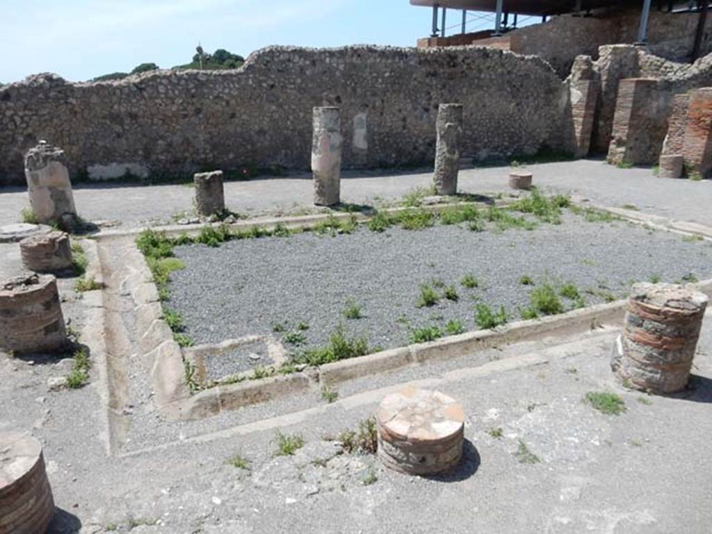 VIII.2.3 Pompeii. May 2018. Looking north towards room in north-east corner of peristyle garden.
On the right of this room is a passageway leading to VIII.2.4. Photo courtesy of Buzz Ferebee.
