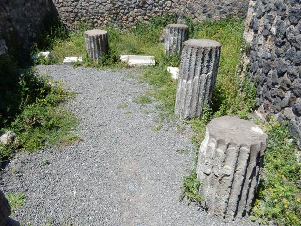 VIII.2.5 Pompeii. May 2018. Looking north towards area described as a colonnaded courtyard, of which two columns remained covered with stucco, which then had the function of supporting the roof of the latrine. Photo courtesy of Buzz Ferebee.

