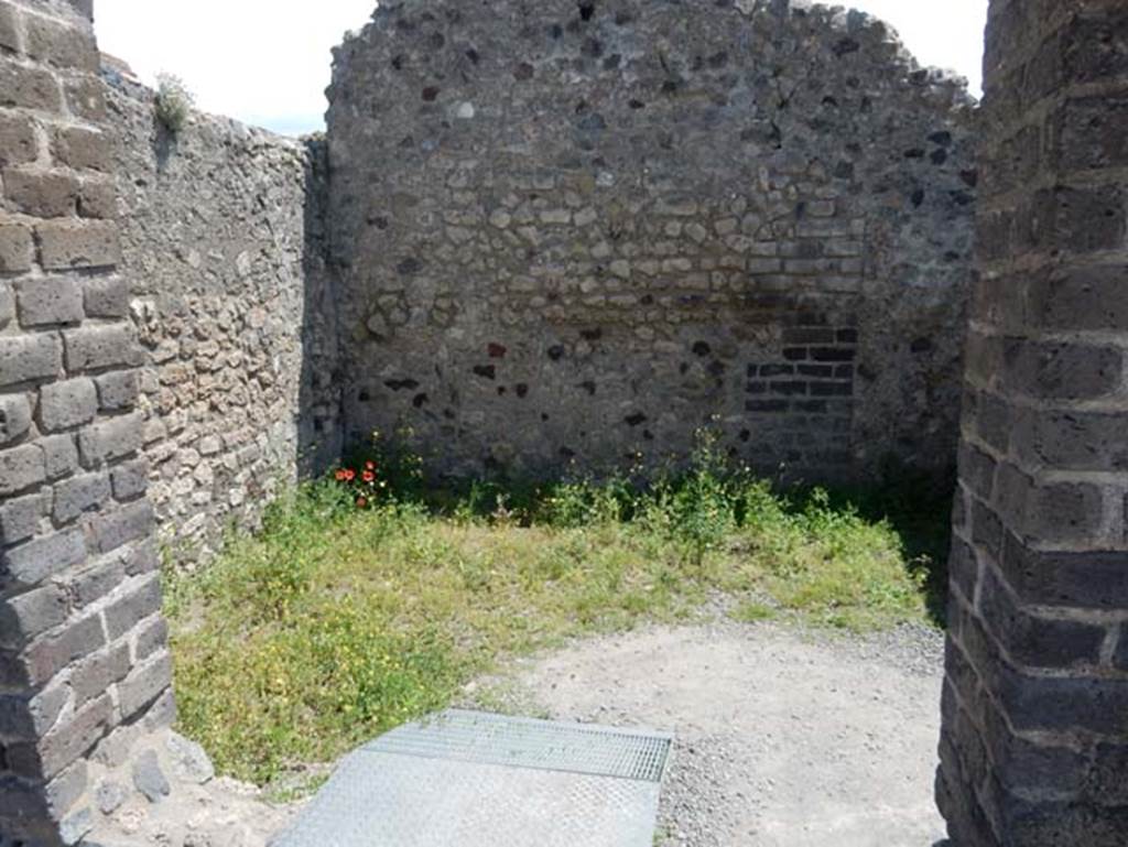 VIII.2.14/16 Pompeii. May 2018. Looking south into room in south-east corner of peristyle, opposite the pool. Resting against the south door-jamb of this entrance doorway, the remarkable emblema of the Rape of the Leucippides, but very severely fragmented, was found.. Photo courtesy of Buzz Ferebee.
