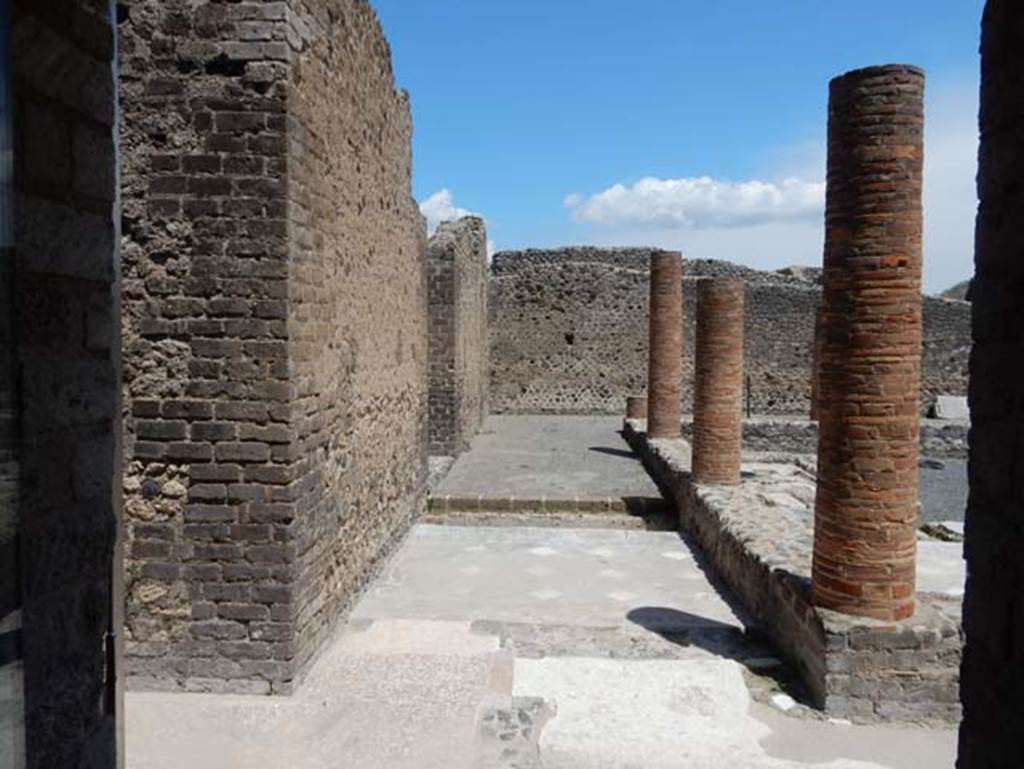 VIII.2.13/14/16 Pompeii. May 2018. Looking east from doorway leading from rear of VIII.2.5, across north portico of peristyle. Photo courtesy of Buzz Ferebee.
