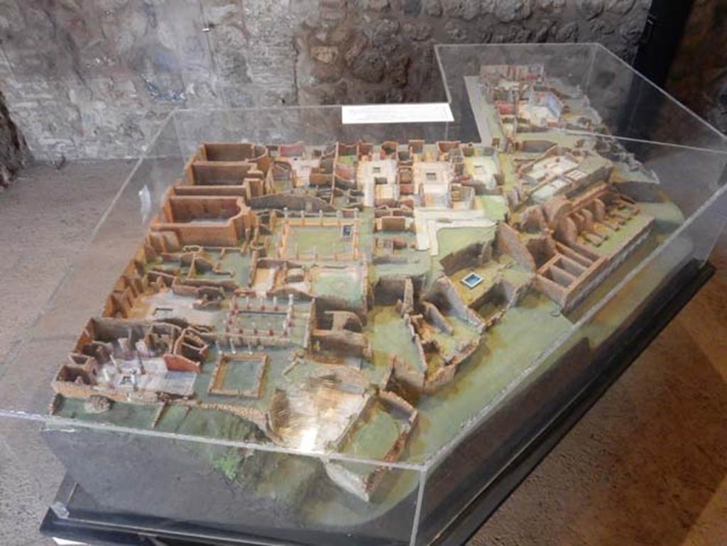 VIII.2 Pompeii. May 2018. Cork model of area seen from the west, with the Houses of Championnet, seen on the left, and Sarno Baths, on the right. 
Photo courtesy of Buzz Ferebee.
