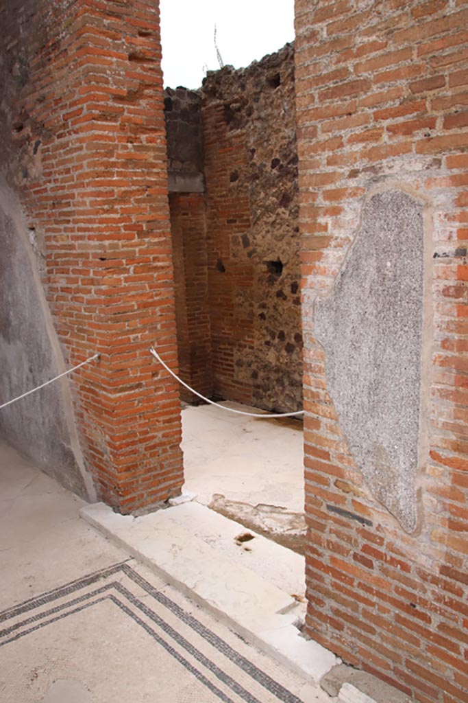 VIII.2.16 Pompeii. May 2024. 
Looking through doorway in west wall in south-west corner of atrium. Photo courtesy of Klaus Heese.
