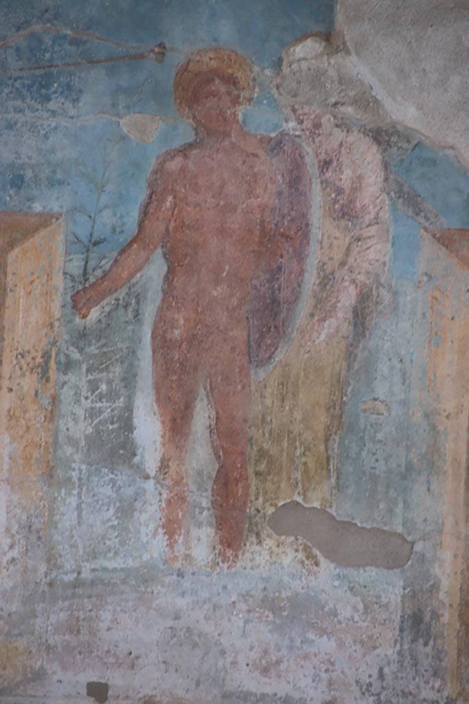 VIII.2.23 Pompeii. October 2022. 
Detail of painted figures in the centre of the south wall. Photo courtesy of Klaus Heese. 
