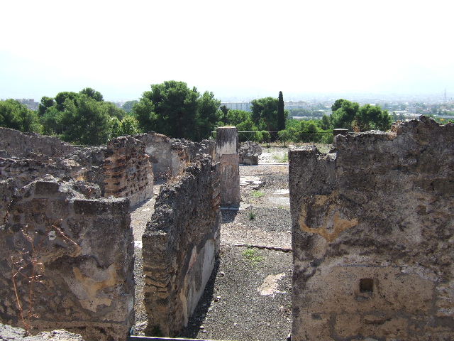 VIII.2.28 Pompeii. September 2005. Looking south towards entrance and atrium, at its rear is the tablinum, and the remains of the terrace. Taken from Casa della Regina Carolina.
