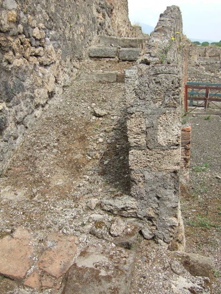 VIII.2.34 Pompeii. May 2006. Looking north at stairs to upper floor, near entrance at VIII.2.33.