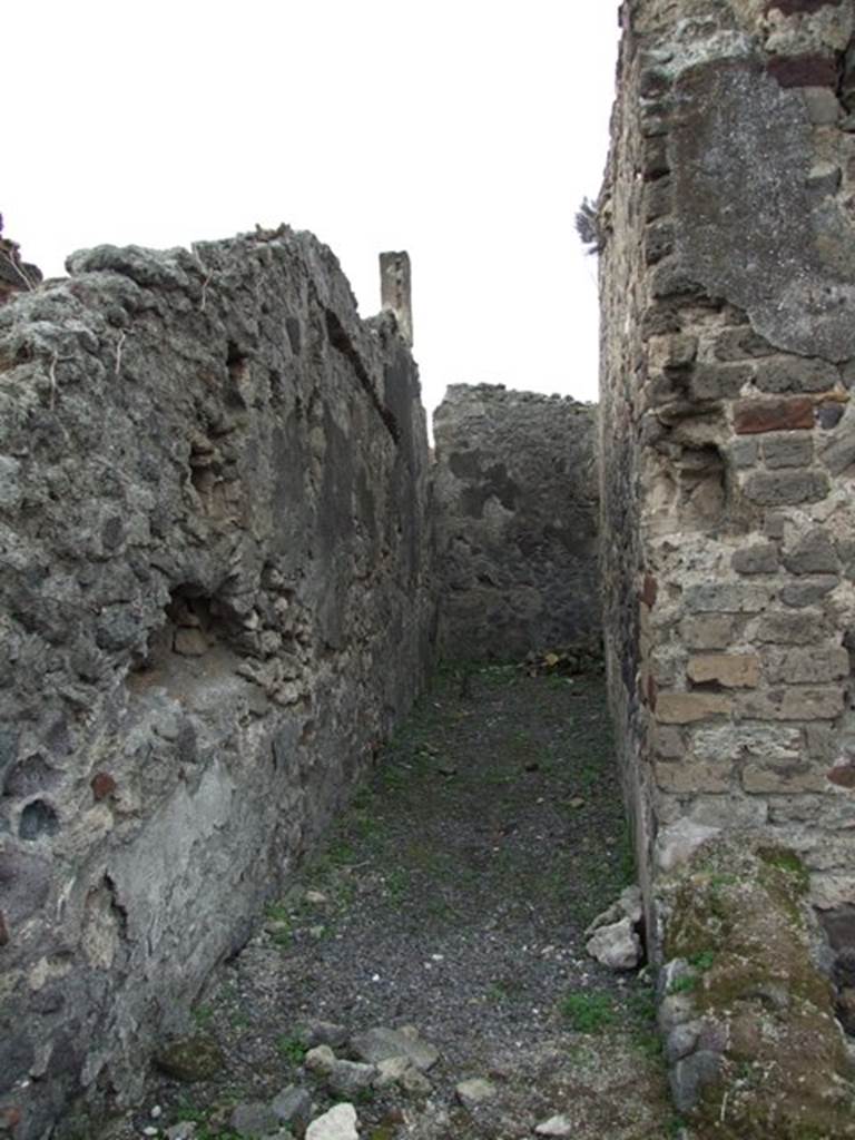 VIII.3.27 or VIII.3.24 Pompeii. December 2007.  Looking west along the long narrow room on south side of the kitchen.

