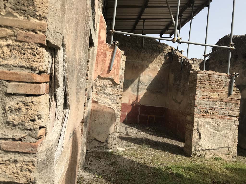 VIII.4.4 Pompeii. April 2019. 
Looking towards north-west corner of portico, with wide entrance of room 18, and corridor room 19, on right. 
Photo courtesy of Rick Bauer.
