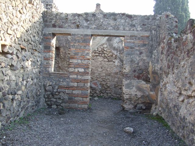 VIII.4.10 Pompeii. Shop and room. December 2007. Rectangular niche in rear room.