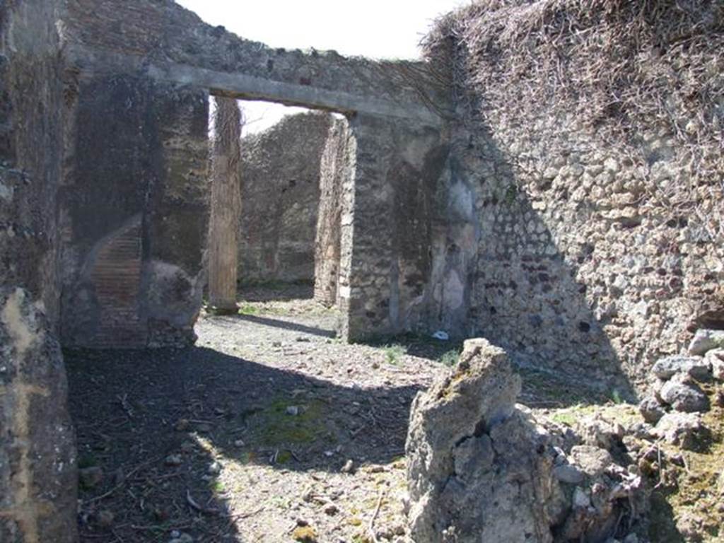 VIII.5.9 Pompeii.  March 2009.  Doorway in remains of south wall of Room 4, Ala, into Room 5, Triclinium.