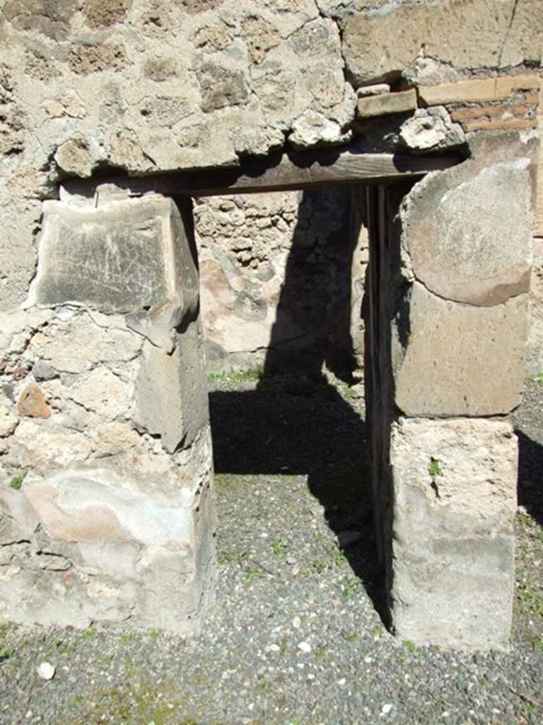 VIII.5.9 Pompeii.  March 2009. Doorway to Room 23, Triclinium,  in the north wall of Room 20.