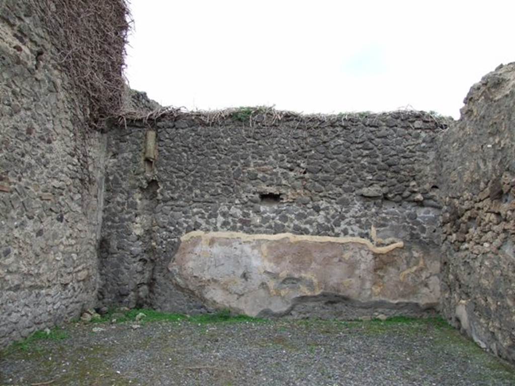 VIII.5.33 Pompeii.  Shop.  December 2007.  West wall with waste pipe from upper floor, possibly from a latrine?