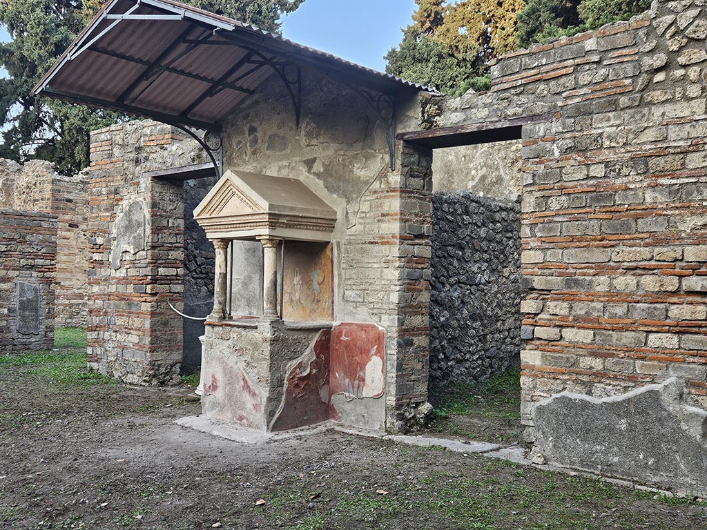 VIII.5.37 Pompeii. November 2024. Room 1, aedicula lararium on east side of atrium. Photo courtesy of Annette Haug.