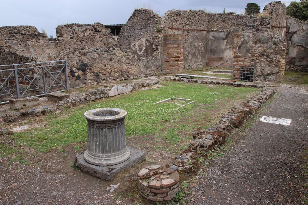 VIII.6.1, Pompeii. December 2018. 
Looking east across peristyle towards the doorway to a triclinium and a storeroom. Photo courtesy of Aude Durand.
