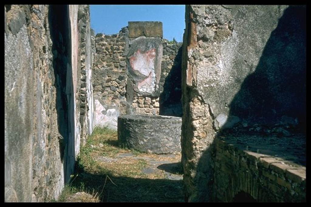 VIII.6.11 Pompeii. Looking east towards bakery from kitchen with hearth. Photographed 1970-79 by Gnther Einhorn, picture courtesy of his son Ralf Einhorn.
According to Mau, the threshold of the kitchen doorway apparently was made of wood.
See BdI, 1884, p.139

