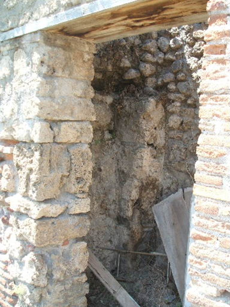 VIII.7.23 Pompeii. May 2005. Doorway to small room or latrine. Looking north-west.