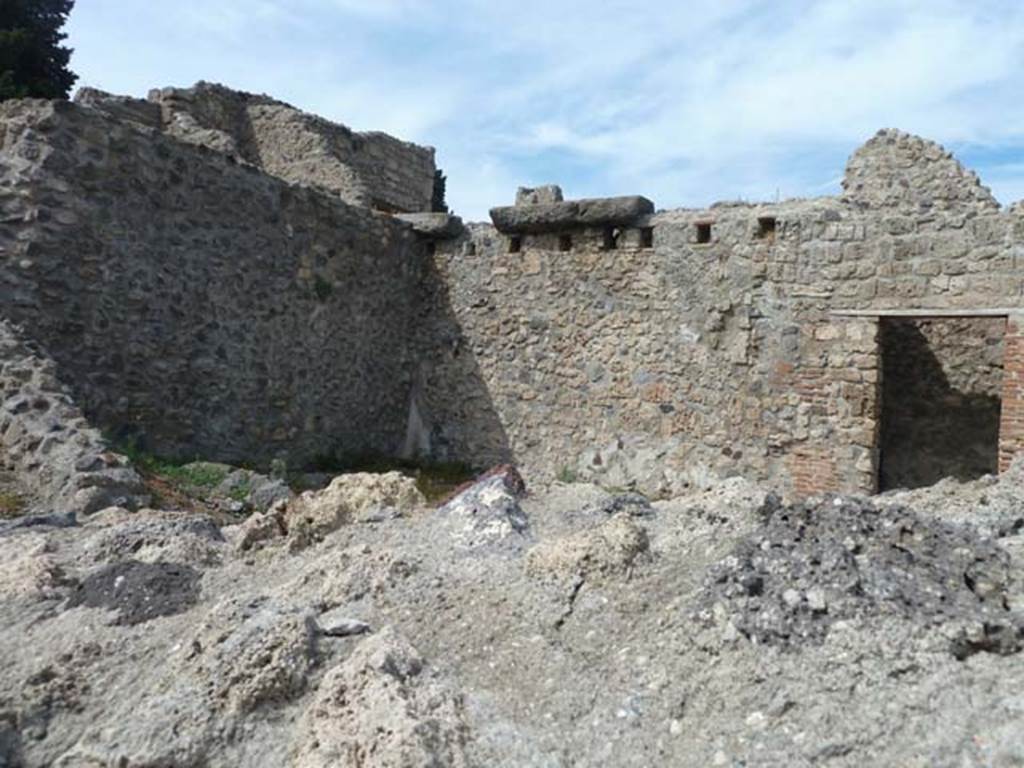 VIII.7.23 Pompeii. September 2015. Looking towards west wall, north-west corner, north wall and doorway to small room. 